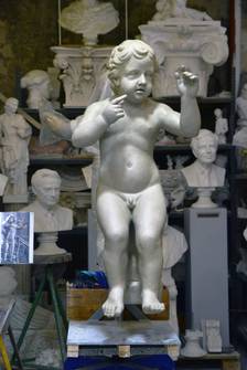 Putto Hornbläser