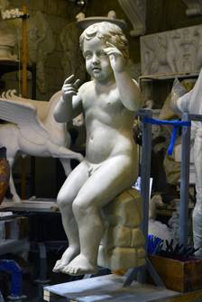 Putto Hornbläser